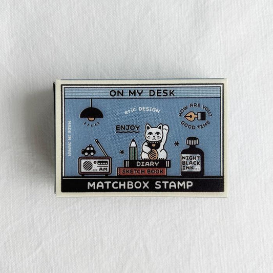 eric x SANBY Matchbox Stamp Set - On My Desk is a charming collection of stamps designed to capture the everyday beauty of desk life. 