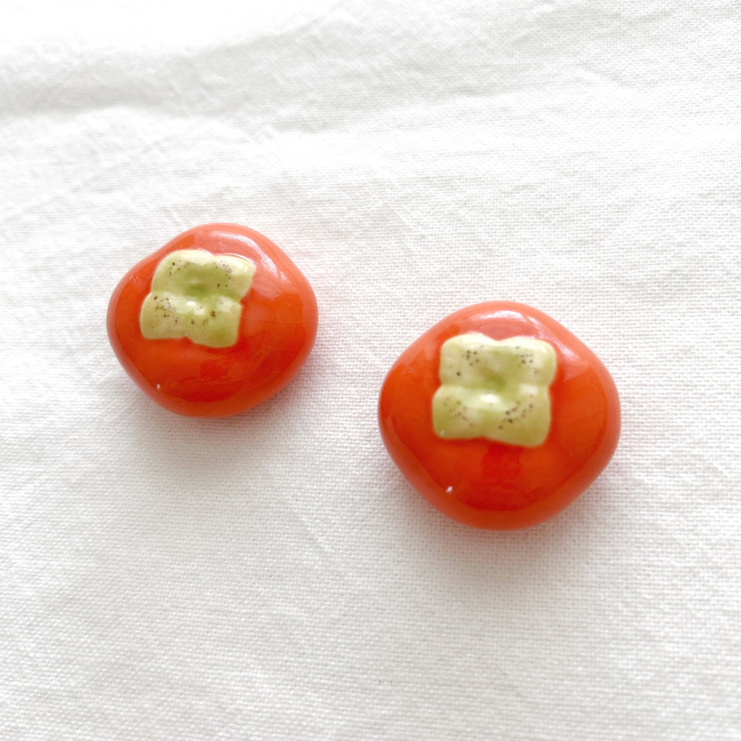 Round orange persimmon ceramic chopstick rest