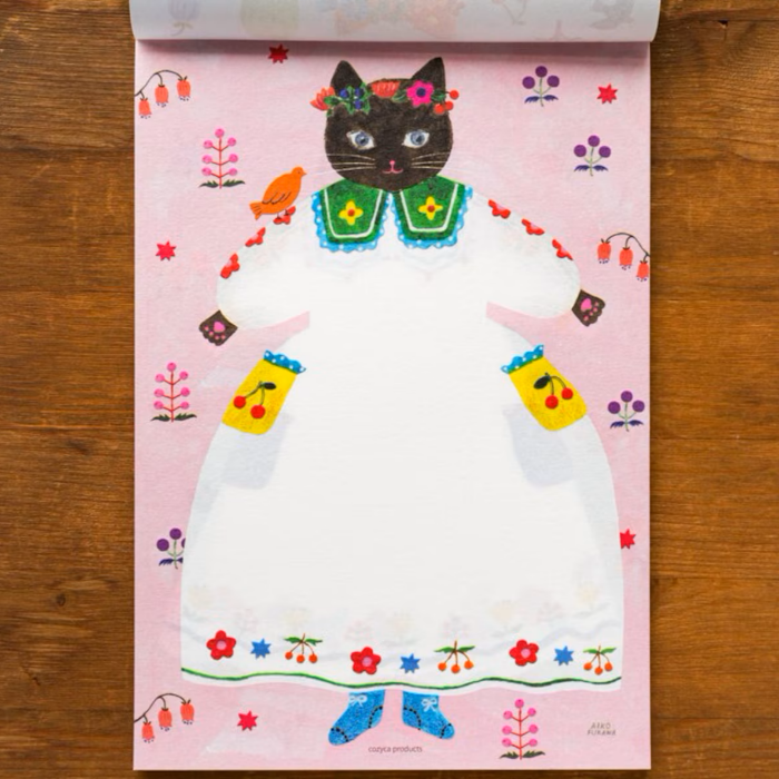 Aiko Fukawa letterhead featuring a cute cat and colorful floral design in a one-piece outfit, Japanese stationery with whimsical illustration style