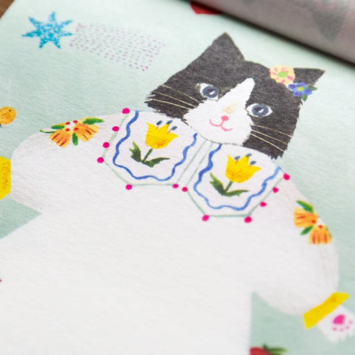 Aiko Fukawa letterhead featuring a cute cat and colorful floral design in a one-piece outfit, Japanese stationery with whimsical illustration style