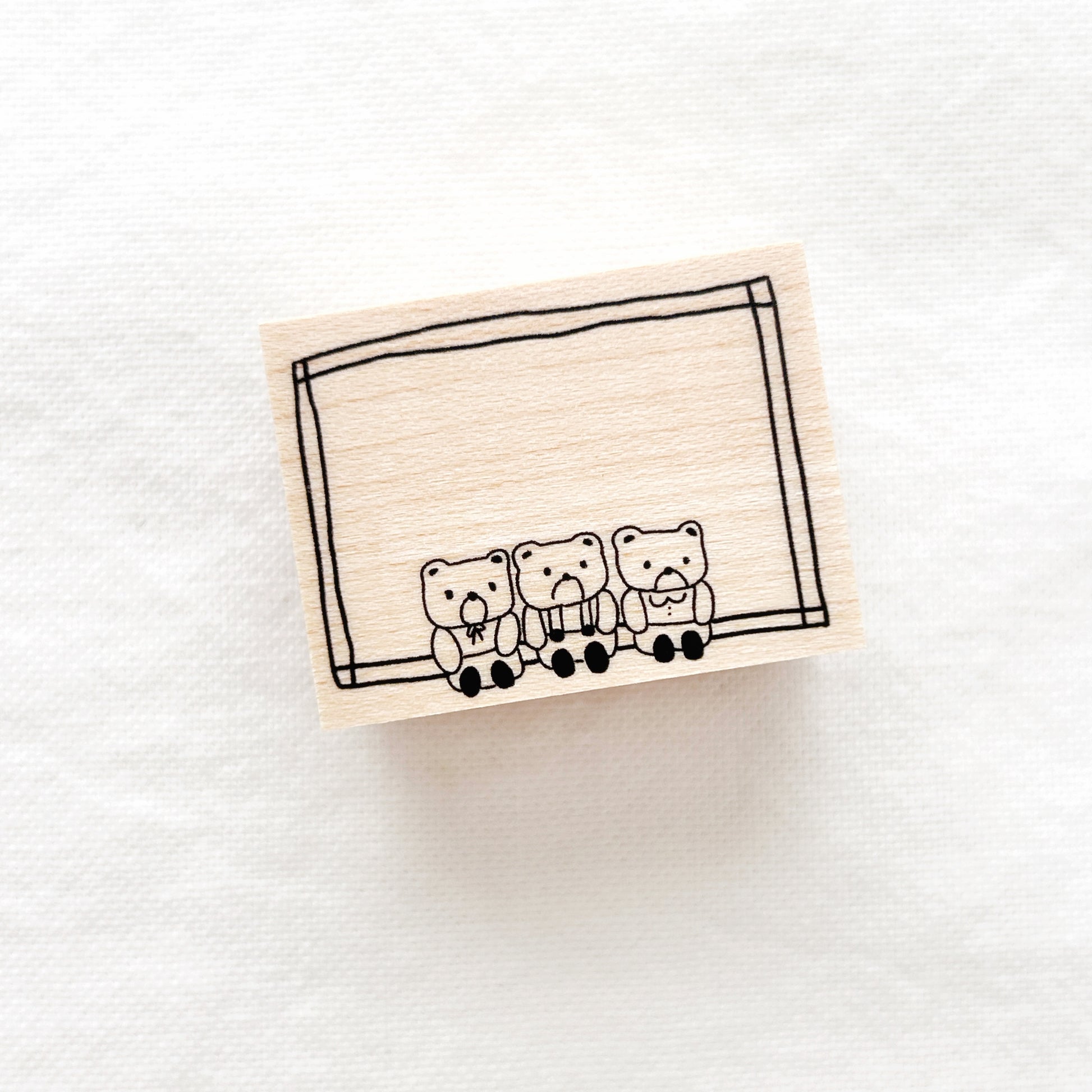 Rubber stamp with three bear illustrations 