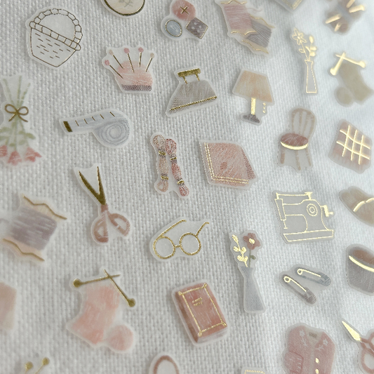 One's Daily Life Gold Foil Sticker - Sewing.  Ideal for embellishing planners, craft journals, or sewing project logs, this sheet celebrates the beauty of handmade crafts and adds a touch of creativity to any project.