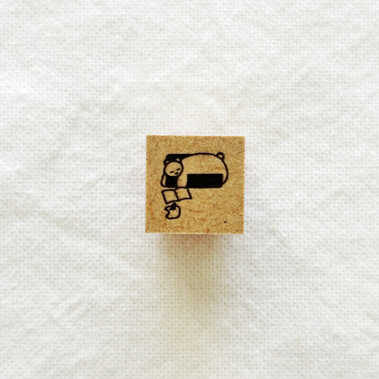 Small square rubber stamp with a sleeping bear
