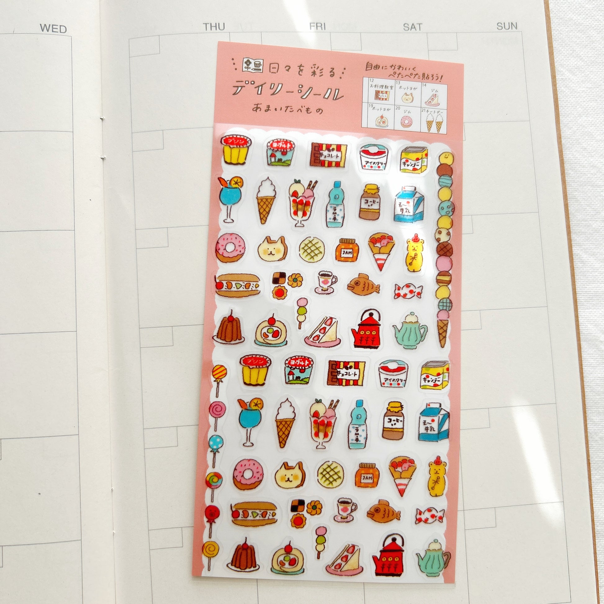 Sheet of colorful stickers with various sweet dessert icons