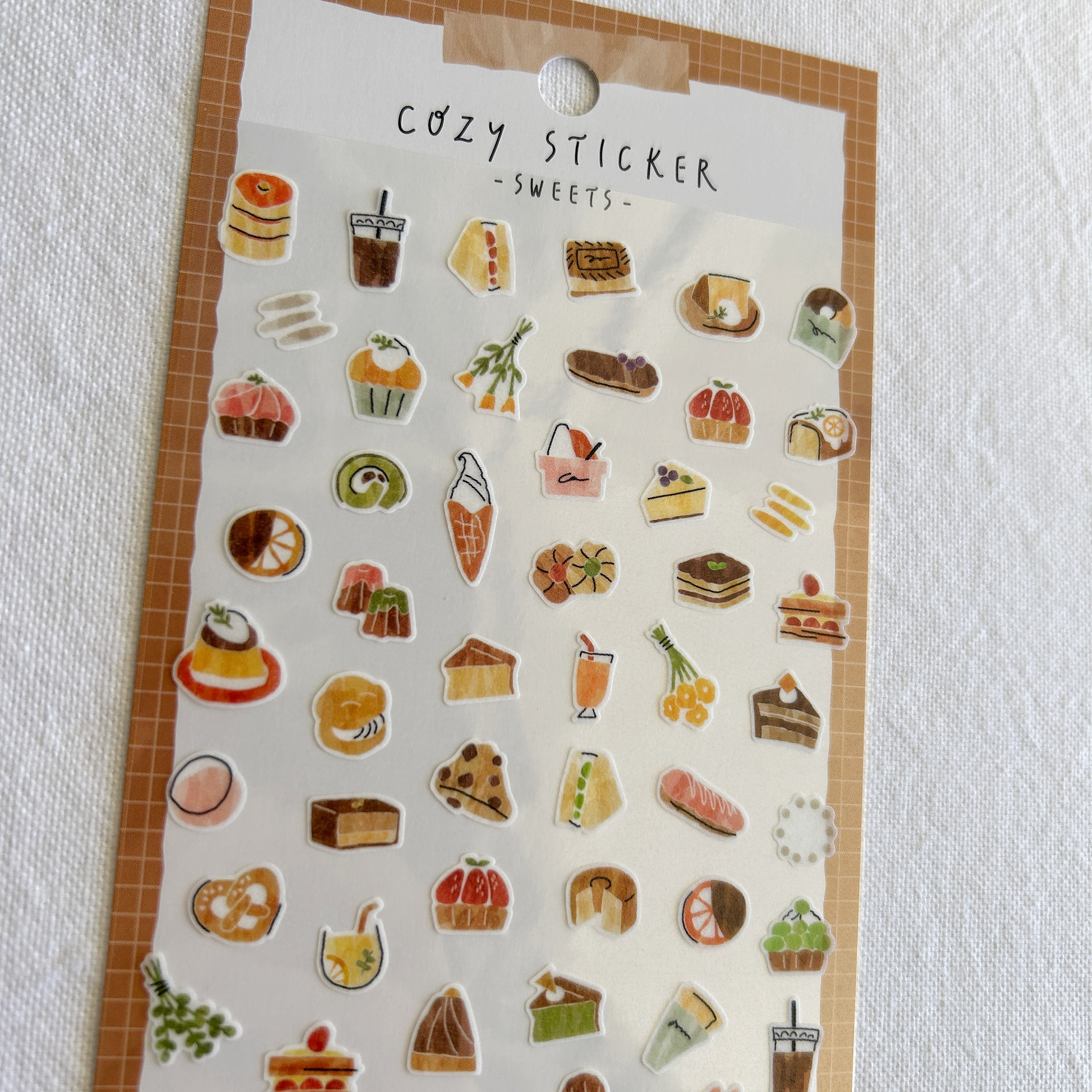 Mind Wave Cozy Sticker - Sweets. With touches of sweetness and delicate details, these stickers are perfect for adding a dash of indulgence to journals, planners, and scrapbooks.