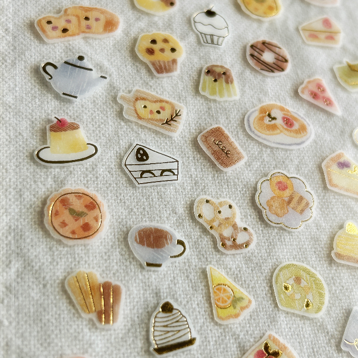 Mind Wave One's Daily Life Gold Foil Sticker – Sweets. Perfect for decorating planners, recipe journals, or treat-themed crafts, this sheet brings the joy of sweets to your daily life.