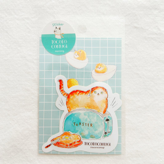 A sticker of a toaster with a cat in it
