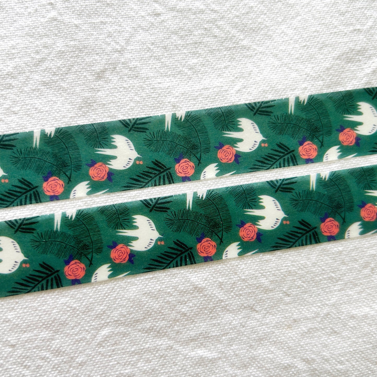 Washi tape of turtle doves and roses on a green background
