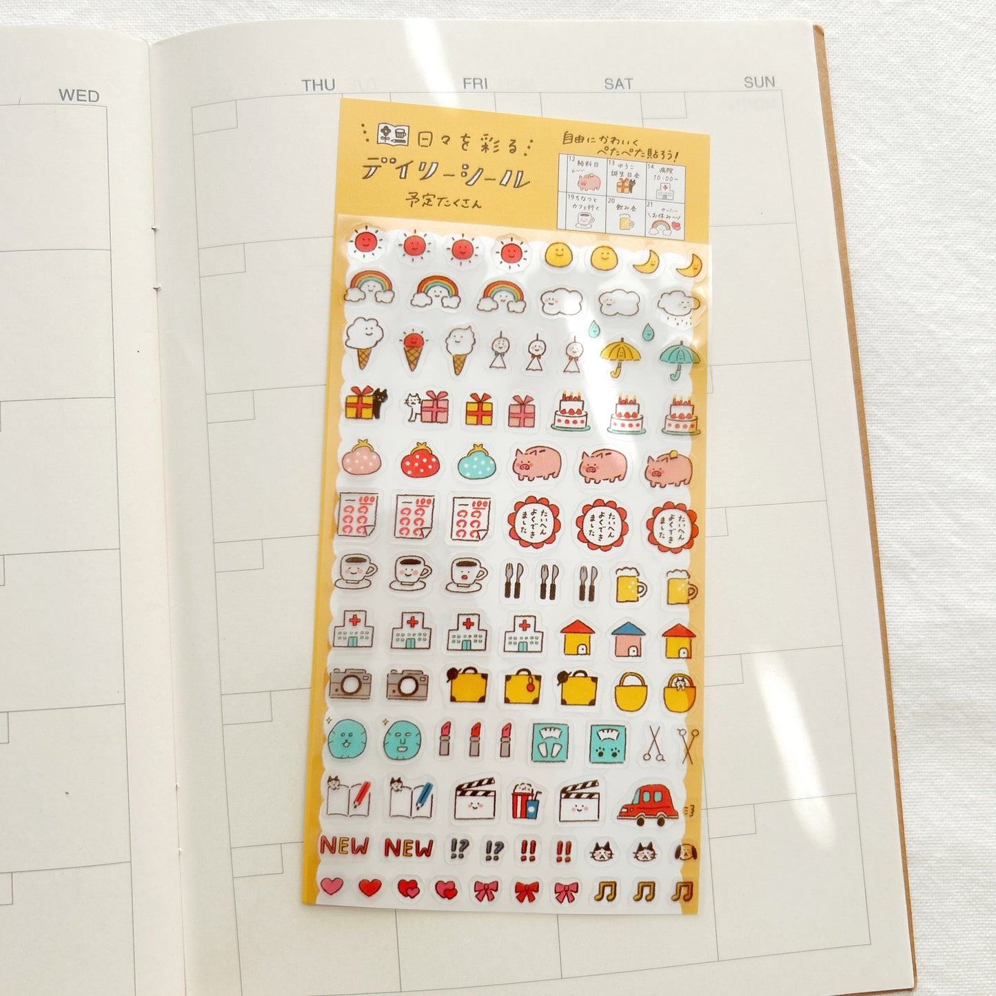 A sticker sheet of small icon stickers of weather