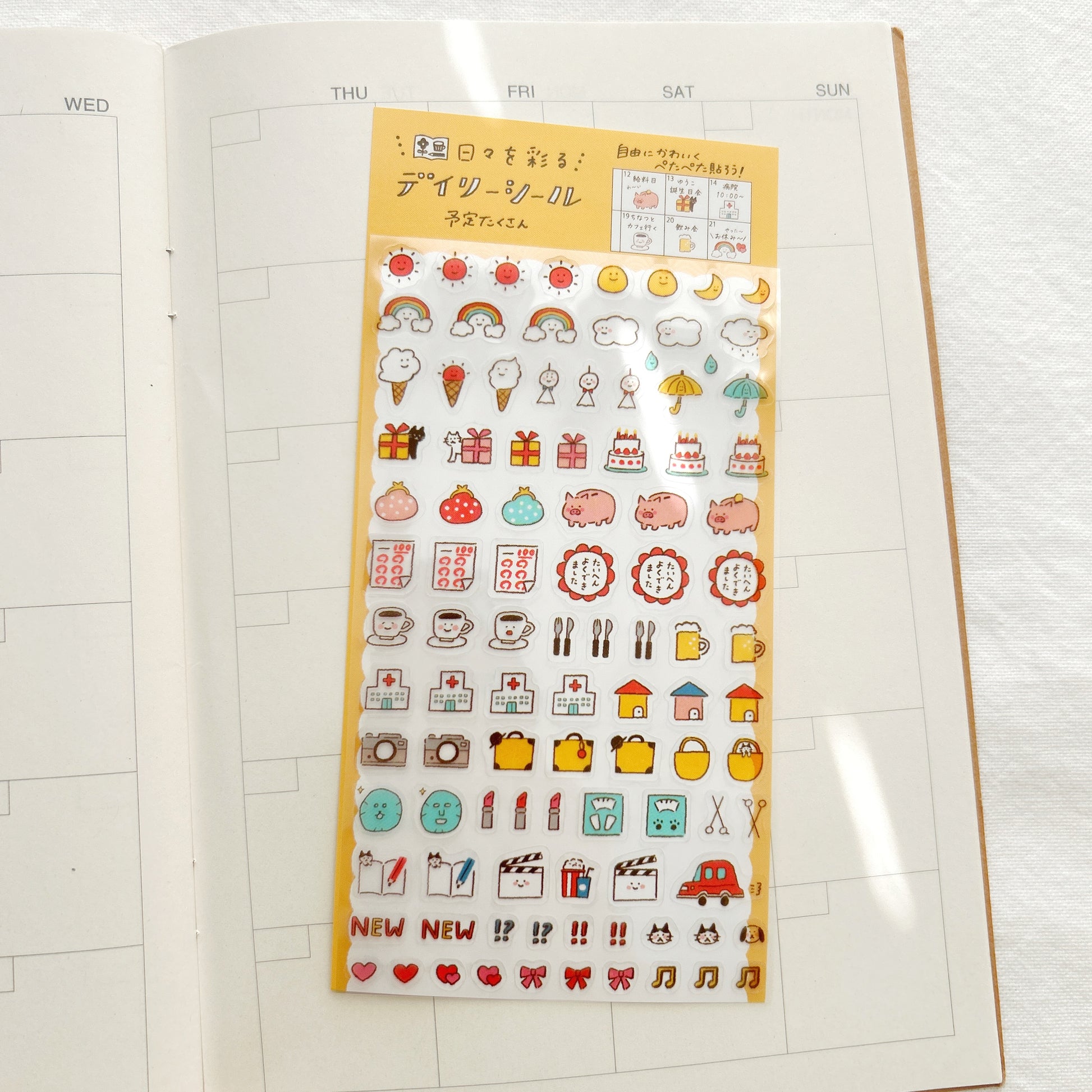 A sticker sheet of small icon stickers of weather