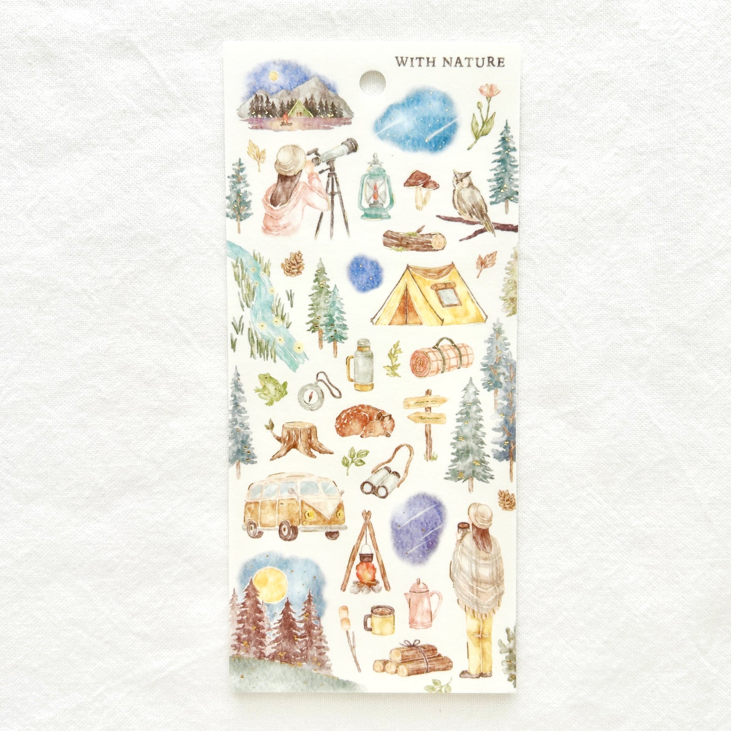 Sticker sheet  features soothing watercolor style illustrations of the wonders of the night sky adorned with delicate gold foil details. 